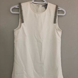 Sleeveless top with embellishments